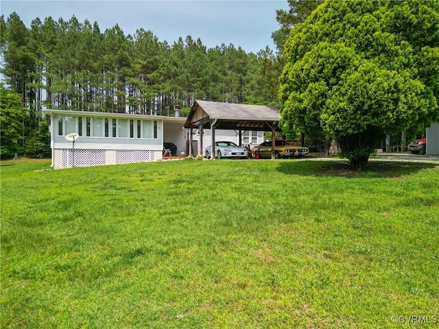 967 Ampthill Rd, Cartersville, VA 23027 - back of house with a lawn and a carport