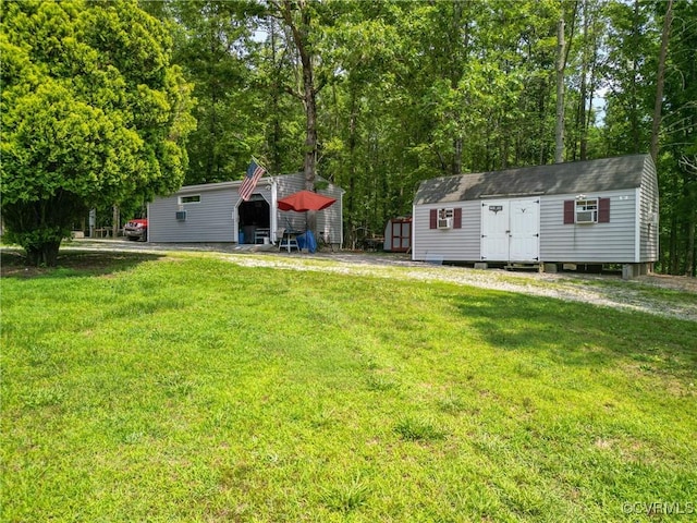 967 Ampthill Rd, Cartersville, VA 23027 - view of green lawn featuring a storage shed