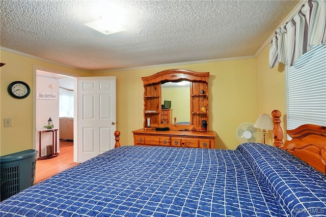 967 Ampthill Rd, Cartersville, VA 23027 - bedroom with a textured ceiling, ornamental molding, and wood finished floors