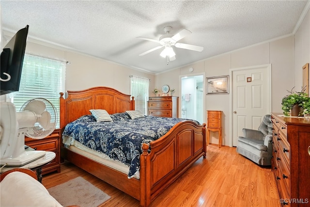 967 Ampthill Rd, Cartersville, VA 23027 - bedroom featuring crown molding, light wood-style flooring, a textured ceiling, ceiling fan, and connected bathroom