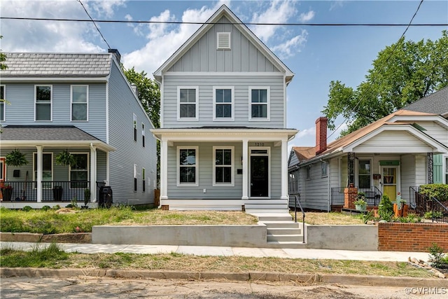 1210 N 36th St, Richmond, VA 23223 - view of front facade with covered porch and board and batten siding