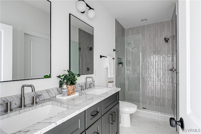 1210 N 36th St, Richmond, VA 23223 - full bathroom with a shower stall, tile patterned floors, and double vanity