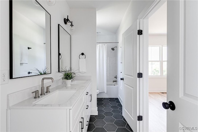 1210 N 36th St, Richmond, VA 23223 - bathroom featuring double vanity, shower / bath combination with curtain, and tile patterned floors