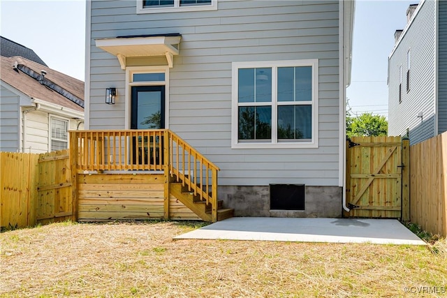 1210 N 36th St, Richmond, VA 23223 - rear view of house with a gate and a patio