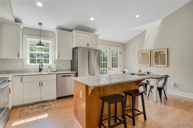 1380 Locust Hill Rd, Aylett, VA 23009 - kitchen featuring stainless steel appliances, plenty of natural light, light wood-type flooring, a kitchen island, and recessed lighting