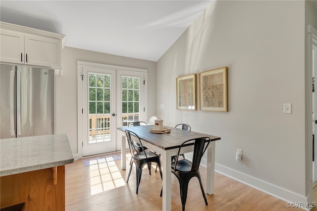 1380 Locust Hill Rd, Aylett, VA 23009 - dining space featuring light wood finished floors, french doors, and lofted ceiling