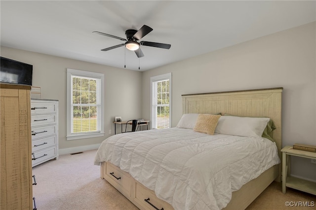 1380 Locust Hill Rd, Aylett, VA 23009 - bedroom with light carpet, multiple windows, and ceiling fan