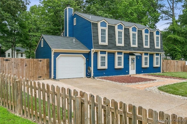 5 Hadley Pl, Newport News, VA 23608 - colonial inspired home with a garage, driveway, a gambrel roof, a chimney, and roof with shingles