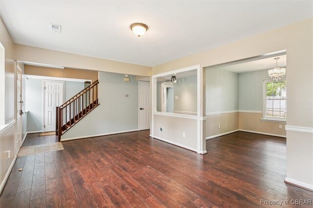 5 Hadley Pl, Newport News, VA 23608 - empty room with hardwood / wood-style floors, stairway, and a chandelier