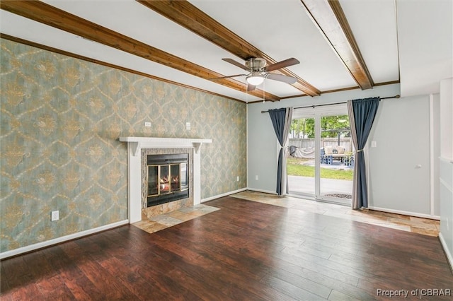 5 Hadley Pl, Newport News, VA 23608 - unfurnished living room featuring ceiling fan, wallpapered walls, hardwood / wood-style floors, a fireplace with flush hearth, and beamed ceiling