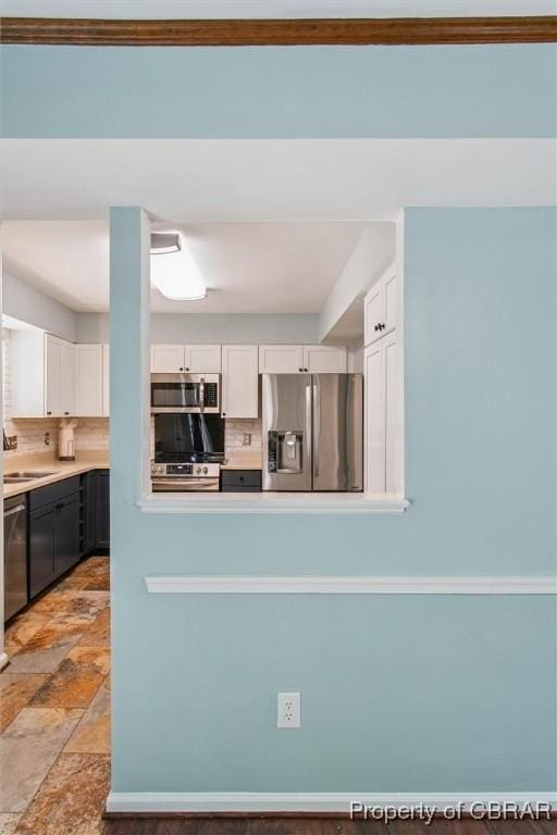 5 Hadley Pl, Newport News, VA 23608 - kitchen with stainless steel appliances, white cabinets, light stone finish flooring, and light countertops