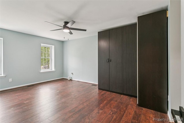 5 Hadley Pl, Newport News, VA 23608 - unfurnished bedroom with dark wood-style floors and a ceiling fan