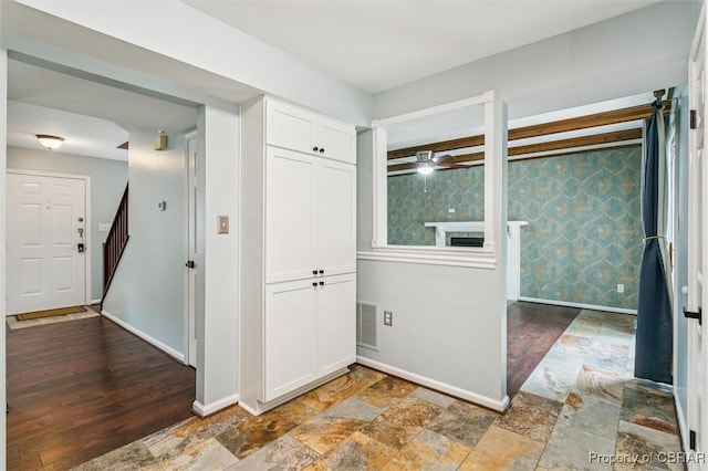 5 Hadley Pl, Newport News, VA 23608 - entrance foyer featuring ceiling fan, stone finish floors, and stairs