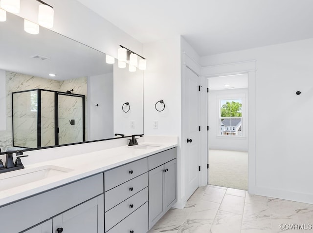 13513 Pinstone Ct, Midlothian, VA 23112 - bathroom featuring marble look tiles, double vanity, and a marble finish shower