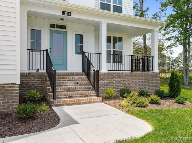 13513 Pinstone Ct, Midlothian, VA 23112 - doorway to property with a porch and board and batten siding