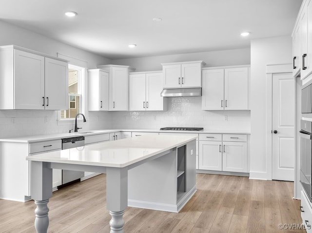 13513 Pinstone Ct, Midlothian, VA 23112 - kitchen featuring stainless steel dishwasher, light countertops, white cabinets, light wood-style flooring, and a kitchen island