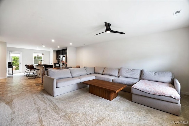 1931 Kennington Park Rd, King William, VA 23009 - living area featuring light carpet, a ceiling fan, and recessed lighting