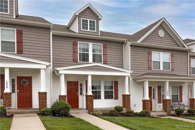 1931 Kennington Park Rd, King William, VA 23009 - townhome / multi-family property featuring covered porch and a front lawn