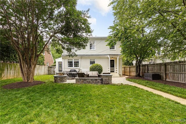 4508 Augusta Ave, Richmond, VA 23230 - rear view of house with an outdoor living space with a fire pit, a fenced backyard, and a patio