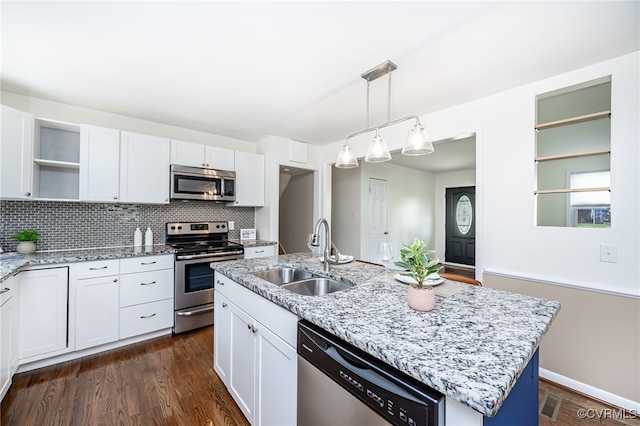 8411 Freestone Ave, Henrico, VA 23229 - kitchen with stainless steel appliances, open shelves, white cabinetry, backsplash, and light stone countertops