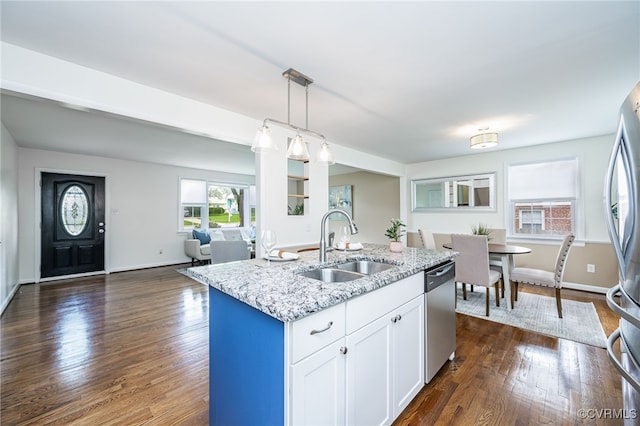 8411 Freestone Ave, Henrico, VA 23229 - kitchen featuring stainless steel appliances, light stone countertops, dark wood-style flooring, a kitchen island with sink, and white cabinetry