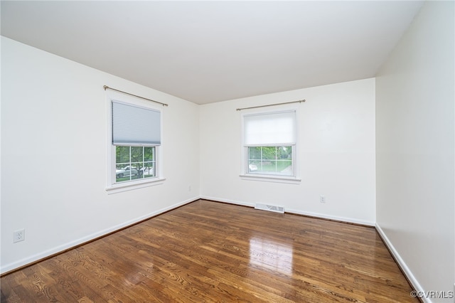 8411 Freestone Ave, Henrico, VA 23229 - spare room with plenty of natural light and wood finished floors