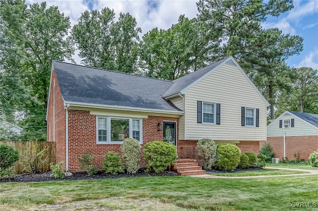 8411 Freestone Ave, Henrico, VA 23229 - tri-level home featuring brick siding and roof with shingles