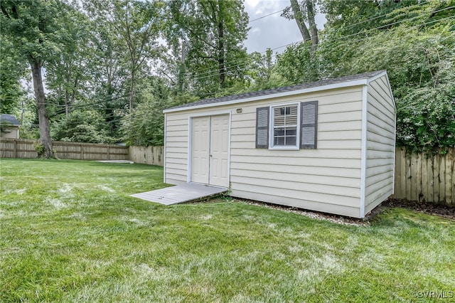 8411 Freestone Ave, Henrico, VA 23229 - view of shed featuring a fenced backyard and view of wooded area