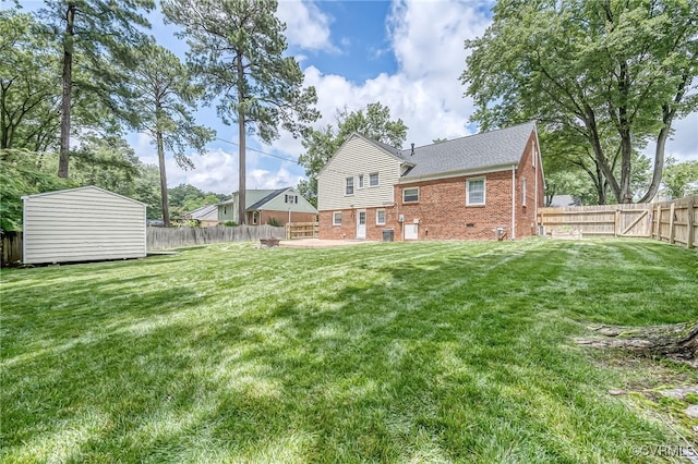 8411 Freestone Ave, Henrico, VA 23229 - rear view of property featuring brick siding, a fenced backyard, a shed, and a patio