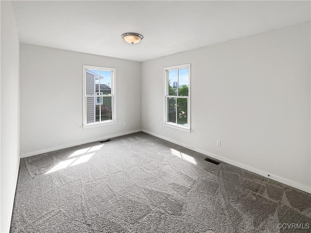 918 N 26th St, Richmond, VA 23223 - spare room featuring carpet flooring and baseboards