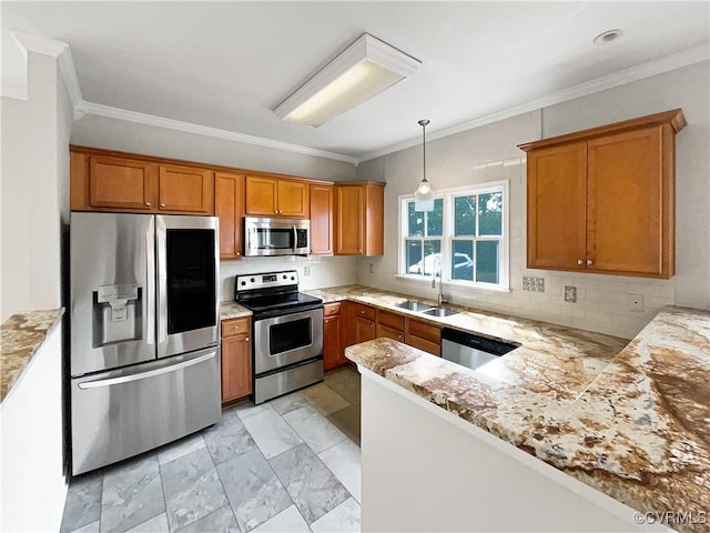 918 N 26th St, Richmond, VA 23223 - kitchen with stainless steel appliances, brown cabinetry, tasteful backsplash, crown molding, and pendant lighting