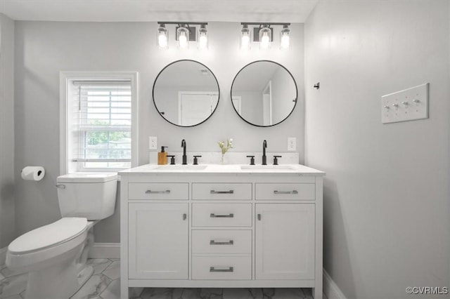 1508 N 29th St, Richmond, VA 23223 - bathroom featuring marble look tiles and double vanity