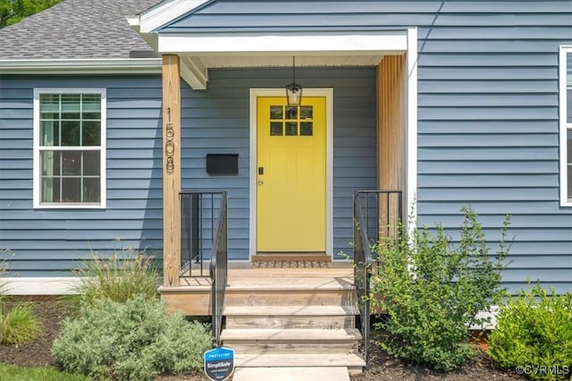 1508 N 29th St, Richmond, VA 23223 - property entrance with a shingled roof and covered porch