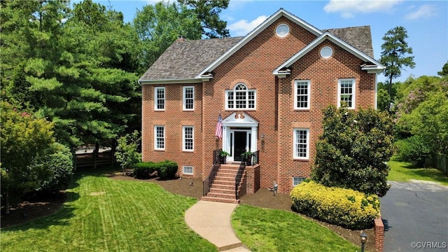 12829 Huntmaster Ln, Henrico, VA 23233 - view of front of property with a front yard and brick siding