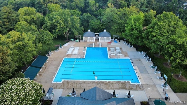 12829 Huntmaster Ln, Henrico, VA 23233 - community pool with a patio and a view of trees