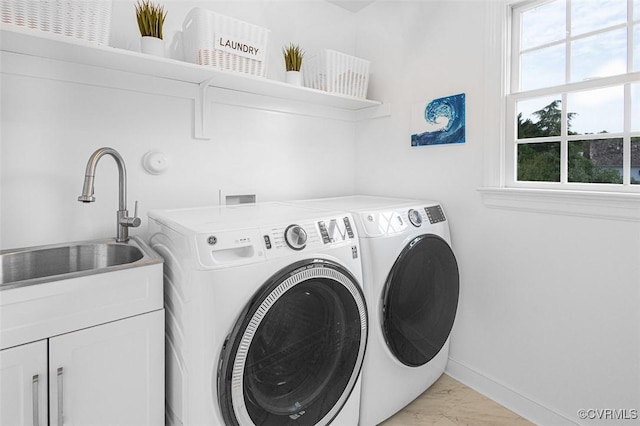 12829 Huntmaster Ln, Henrico, VA 23233 - laundry room featuring washer and dryer, light marble finish flooring, and cabinet space