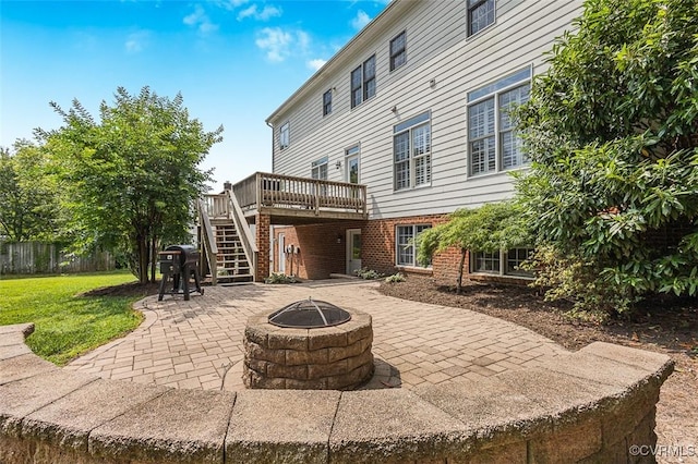 12829 Huntmaster Ln, Henrico, VA 23233 - view of patio with stairs, a wooden deck, and an outdoor fire pit