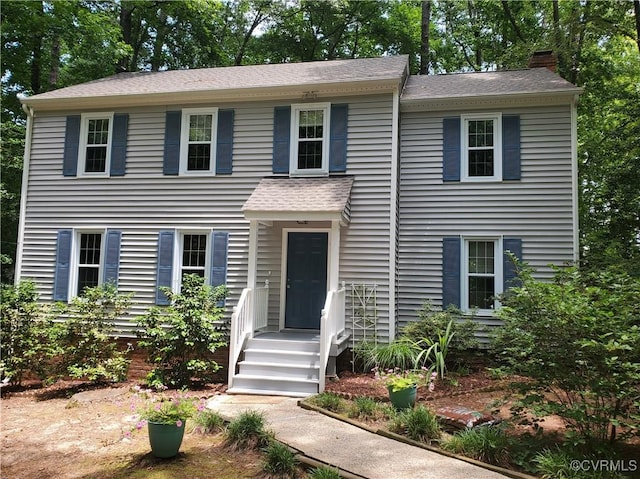 3401 Quail Hill Dr, Chesterfield, VA 23112 - view of front of home with a chimney and a shingled roof