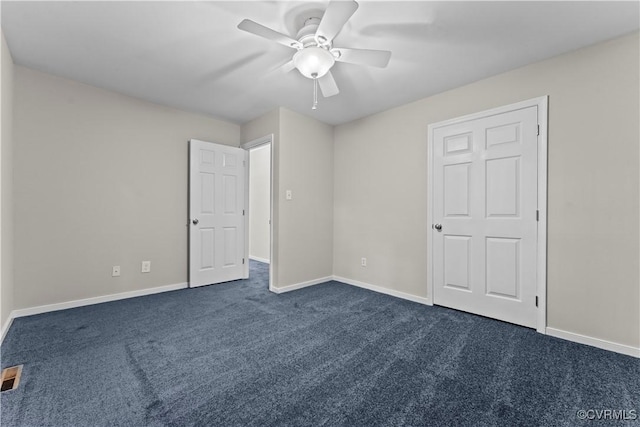 3401 Quail Hill Dr, Chesterfield, VA 23112 - unfurnished bedroom with dark colored carpet and a ceiling fan
