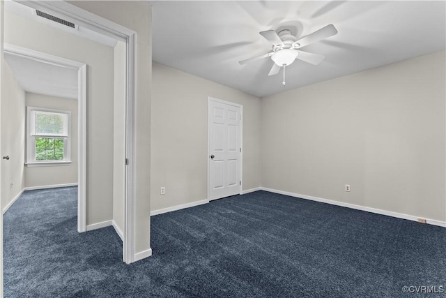 3401 Quail Hill Dr, Chesterfield, VA 23112 - unfurnished bedroom featuring dark carpet and a ceiling fan