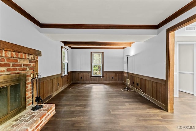 3401 Quail Hill Dr, Chesterfield, VA 23112 - unfurnished living room with a wainscoted wall, wood finished floors, beamed ceiling, crown molding, and a brick fireplace