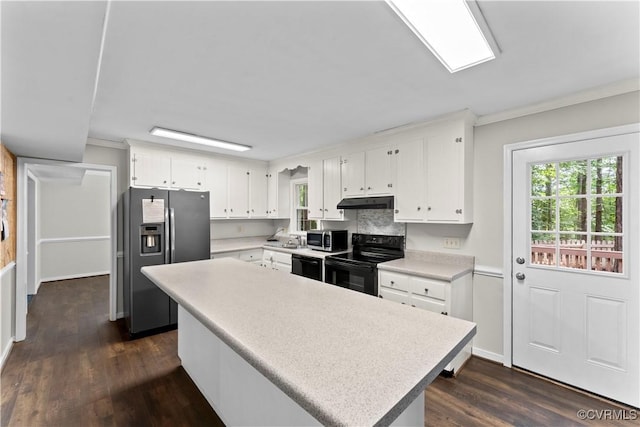 3401 Quail Hill Dr, Chesterfield, VA 23112 - kitchen featuring black appliances, light countertops, white cabinets, healthy amount of natural light, and crown molding