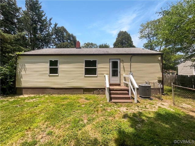 943 Barlen Dr, Richmond, VA 23225 - rear view of property with a chimney