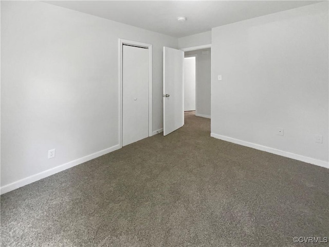 943 Barlen Dr, Richmond, VA 23225 - unfurnished bedroom with dark colored carpet and a closet