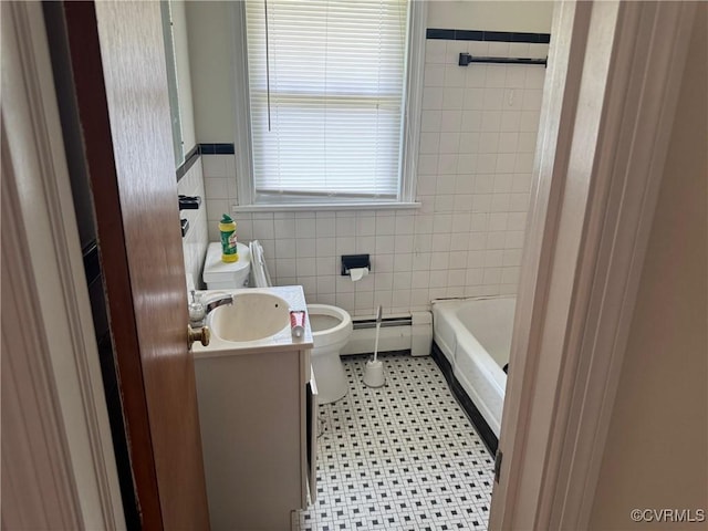 516 Kramer Dr, Highland Springs, VA 23075 - full bathroom featuring tile walls, baseboard heating, a bathtub, vanity, and tile patterned floors