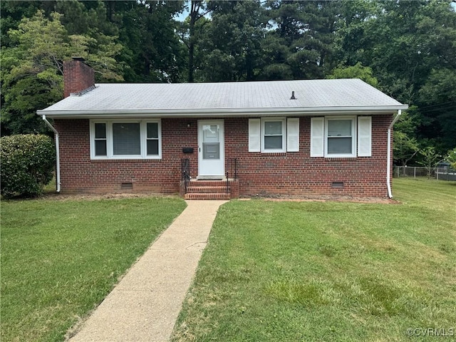 516 Kramer Dr, Highland Springs, VA 23075 - view of front of house featuring crawl space, brick siding, and a chimney