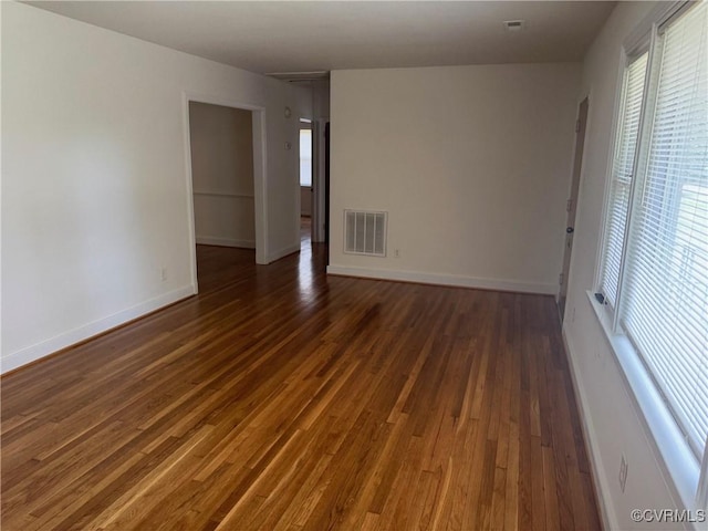 516 Kramer Dr, Highland Springs, VA 23075 - unfurnished room featuring plenty of natural light and wood finished floors