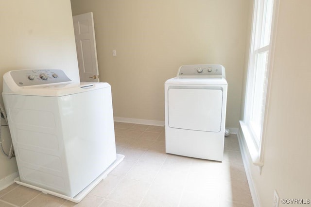 9307 Oak Trl, Ashland, VA 23005 - washroom featuring washer and clothes dryer and light tile patterned flooring