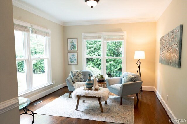 9307 Oak Trl, Ashland, VA 23005 - living area with dark wood-type flooring and crown molding