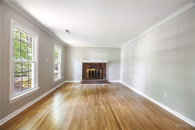 4605 Kingsrow Ct, Glen Allen, VA 23060 - unfurnished living room with light wood finished floors, crown molding, and a fireplace